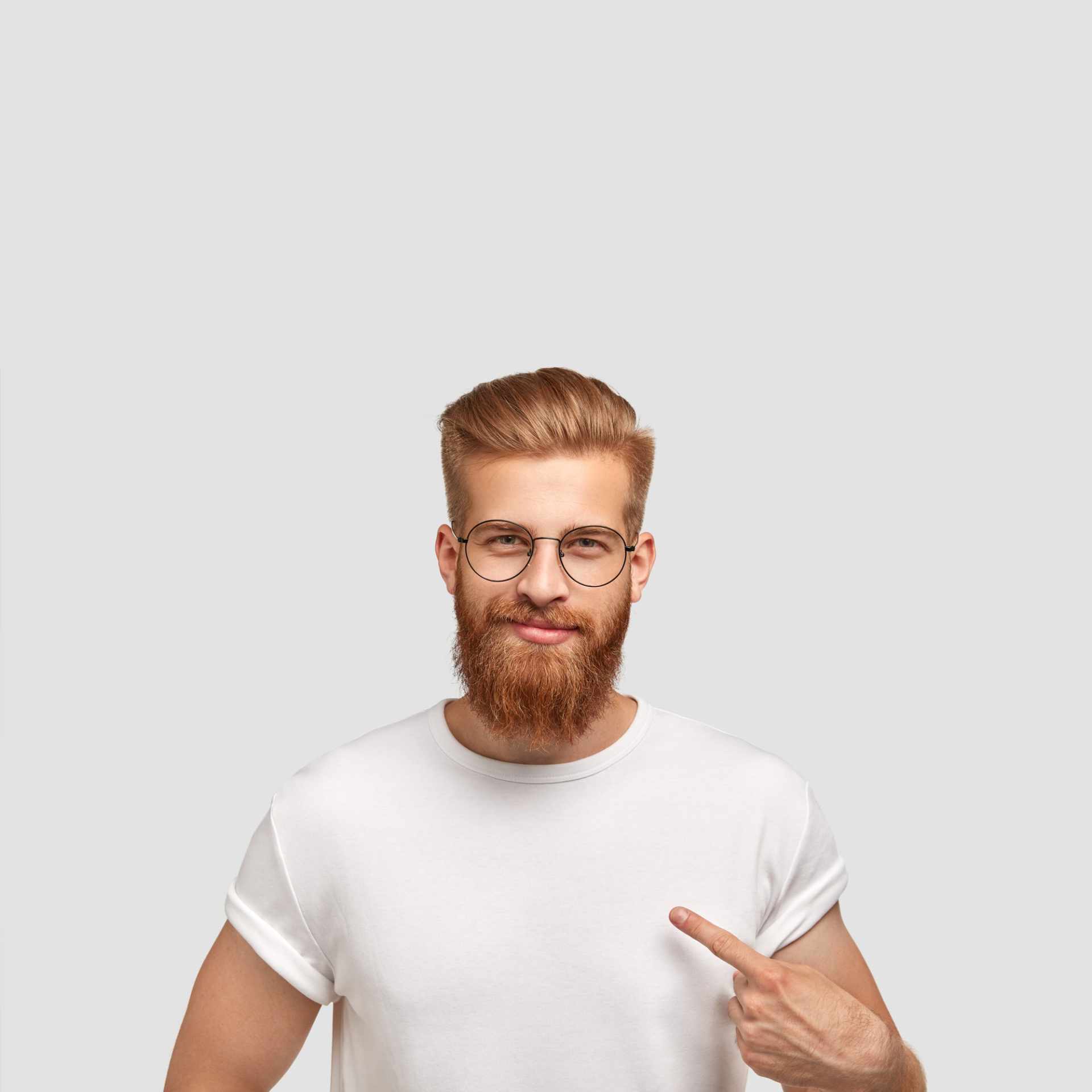 attractive-man-model-with-trendy-hairdo-beard-dressed-white-t-shirt
